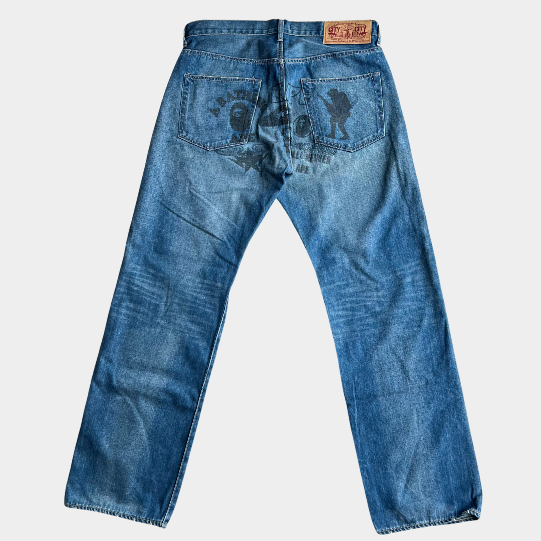 A Bathing Ape BAPE Guerilla Multilogo Graphic Baggy Jeans