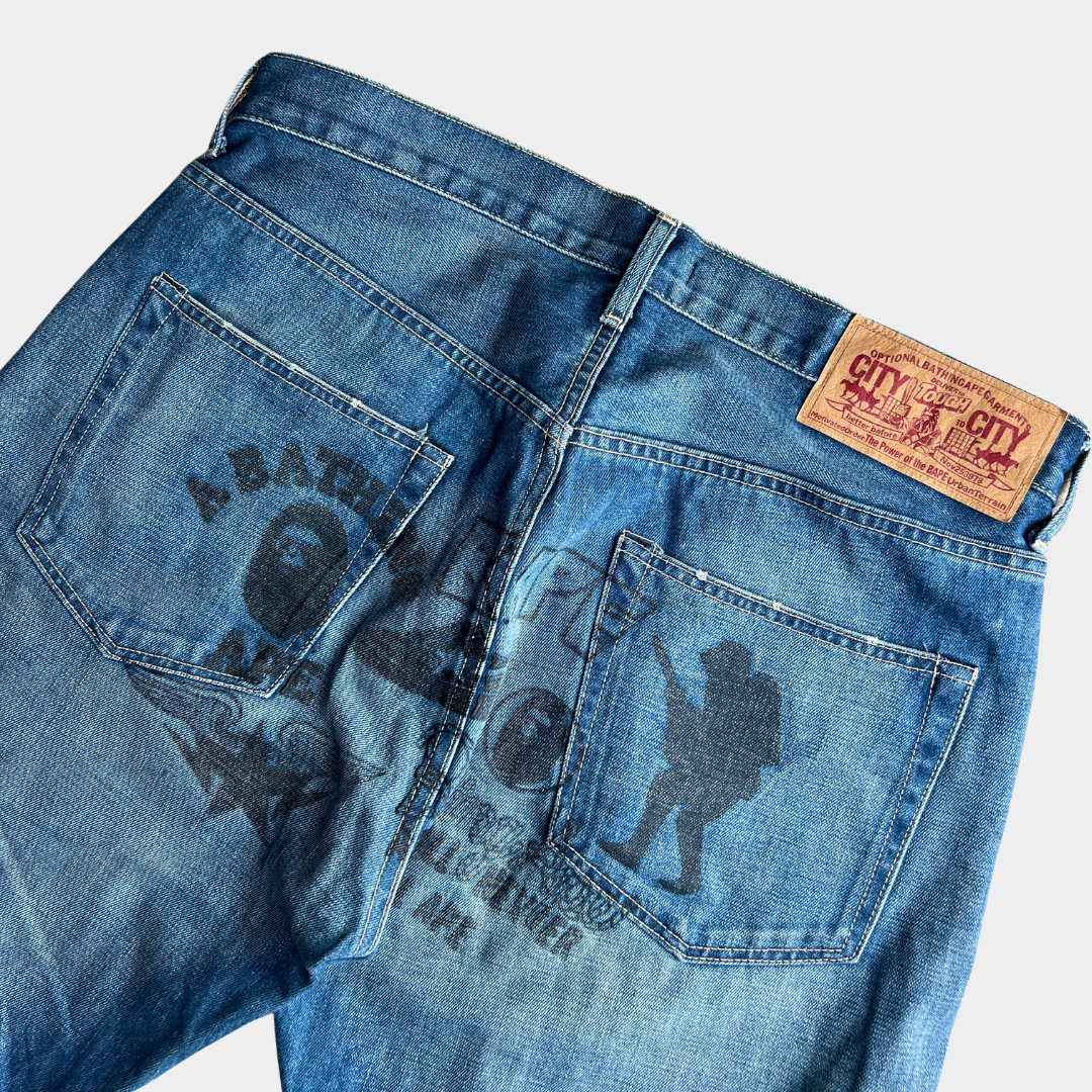 A Bathing Ape BAPE Guerilla Multilogo Graphic Baggy Jeans